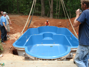 Sedona fiberglass pool being craned into place